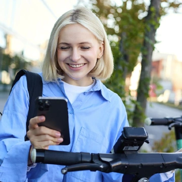 Team defining project requirements around a laptop